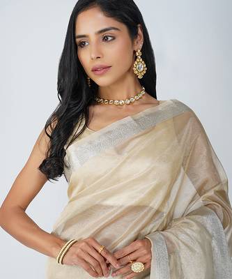 beige handloom tissue silk saree with subtle shimmer finish 5
