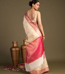 beige handloom pure silk saree with contrast pink border