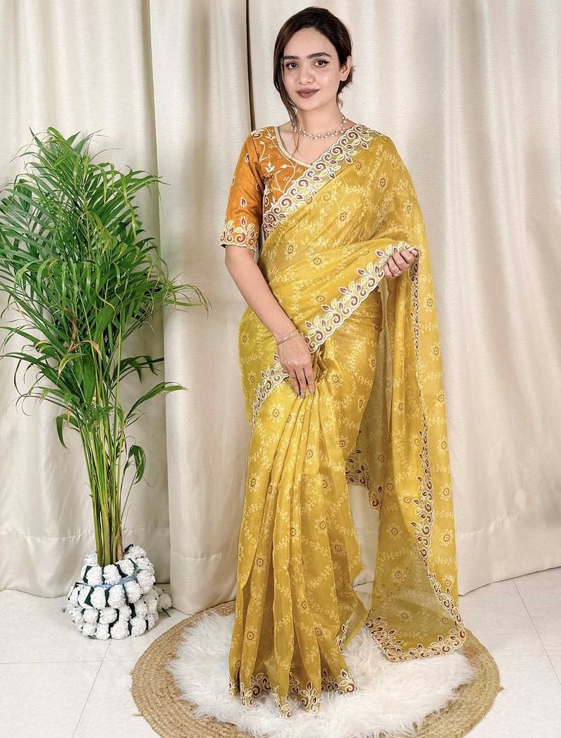 Mustard cotton satin weaving zari border embroiderd saree with matching blouse piece
