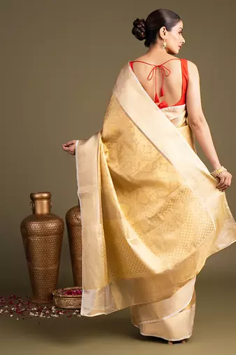 golden handloom banarasi silk saree with classic woven border