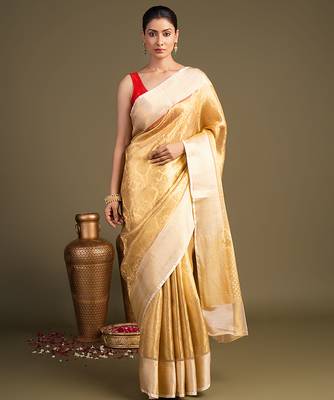 golden handloom banarasi silk saree with classic woven border 1