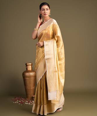 golden handloom banarasi silk saree with classic woven border 3