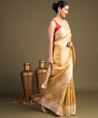golden handloom banarasi silk saree with classic woven border 4