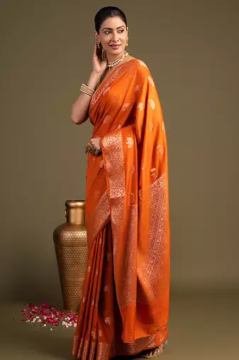 orange handloom banarasi silk saree with rich zari work