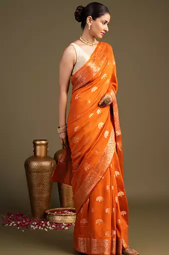 orange handloom banarasi silk saree with rich zari work