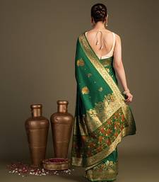 green handloom pure silk saree with rich zari border