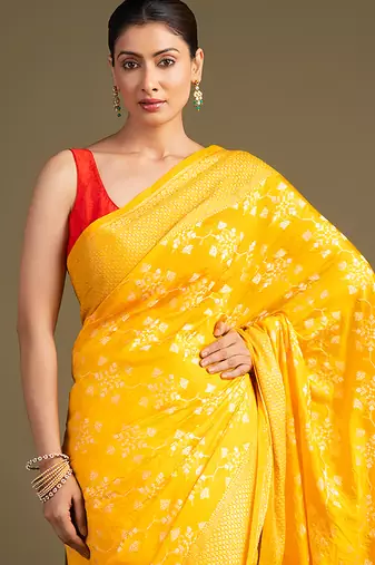 yellow handloom pure silk saree with elegant woven detailing