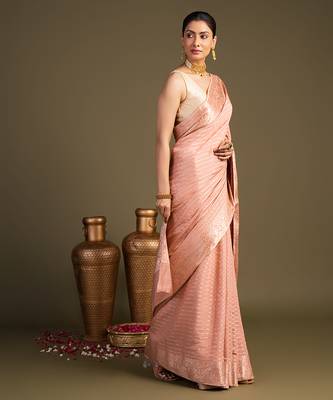 peach handloom banarasi silk saree with elegant woven motifs 3