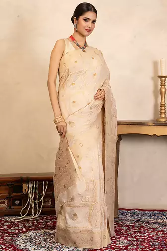 beige handloom pure silk saree with subtle zari motifs