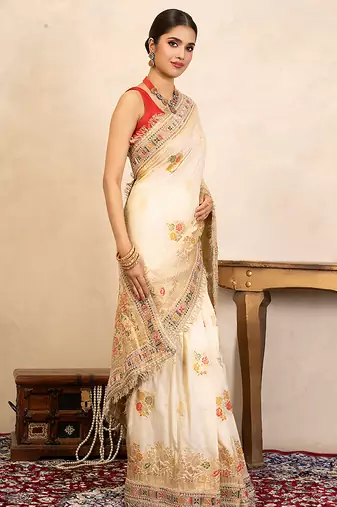 cream handloom banarasi silk saree with floral zari work