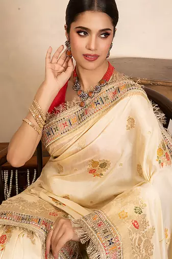 cream handloom banarasi silk saree with floral zari work