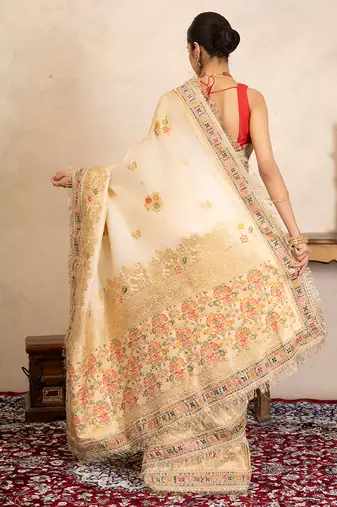 cream handloom banarasi silk saree with floral zari work