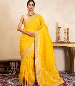 yellow handloom banarasi silk saree with zari border