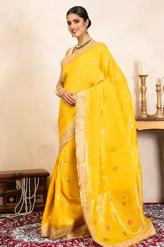 yellow handloom banarasi silk saree with zari border