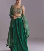 GREEN EMBROIDERY WORK FLARED LEHENGA CHOLI WITH DUPATTA.