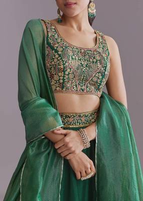 GREEN EMBROIDERY WORK FLARED LEHENGA CHOLI WITH DUPATTA. 2