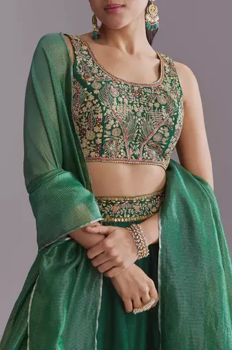 GREEN EMBROIDERY WORK FLARED LEHENGA CHOLI WITH DUPATTA.