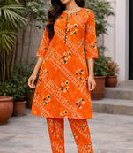 Orange bandhej kurta with pant
peal embelishment on sleeves & body