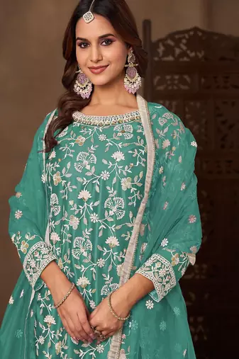 Teal green net  zari work salwar kameez suits size up to 42