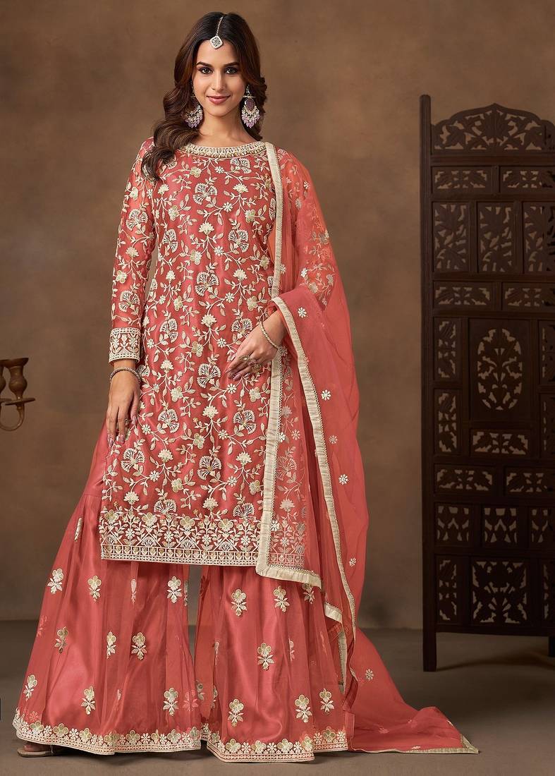 Peach net  zari work salwar kameez suits size up to 42