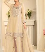 Beige silk mirror work salwar suits free size up to 42