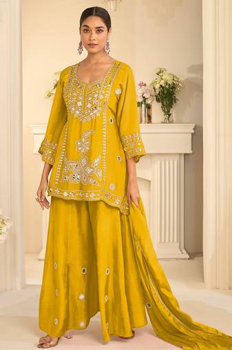 Yellow silk blend mirror work salwar suits free size up to 42