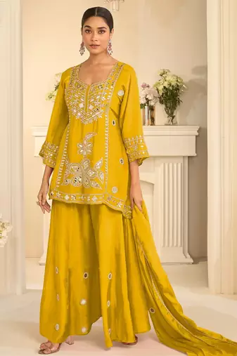 Yellow silk blend mirror work salwar suits free size up to 42