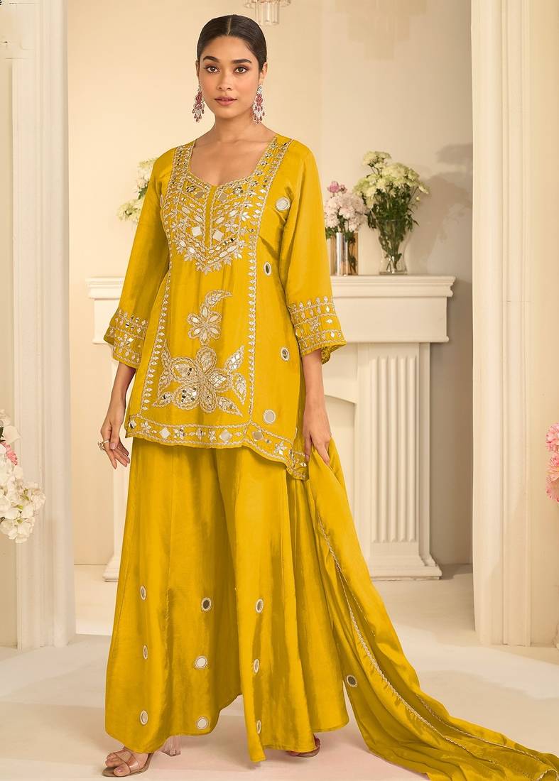Yellow silk blend mirror work salwar suits free size up to 42