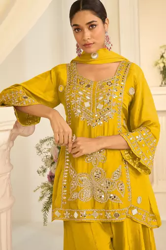 Yellow silk blend mirror work salwar suits free size up to 42