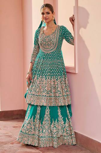 Turquoise georgette sequins work salwar suits free size up to 42