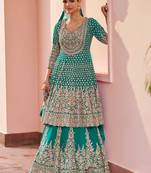 Turquoise georgette sequins work salwar suits free size up to 42
