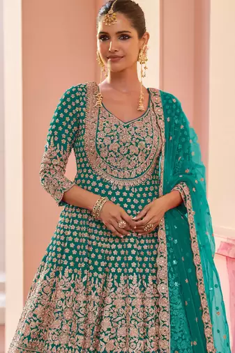 Turquoise georgette sequins work salwar suits free size up to 42