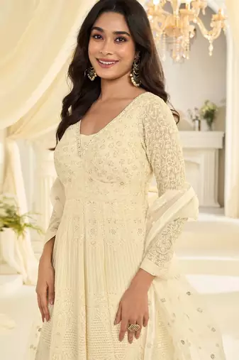 Cream georgette sequins work salwar suits free size up to 42