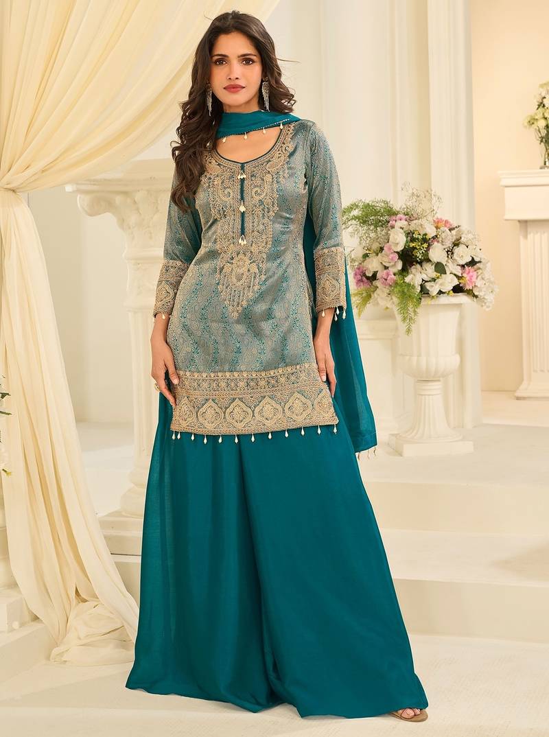 Turquoise silk blend sequins work salwar suits free size up to 42