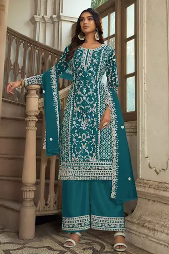 Teal green net sequins work semi stitched salwar suits suits size up to 42