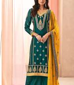 Teal green art silk sequins work semi stitched salwar suits suits size up to 42