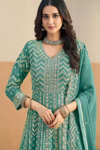 Teal georgette sequins work salwar suits free size up to 42