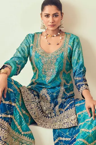 Blue chiffon sequins work semi stitched salwar suits suits size up to 42