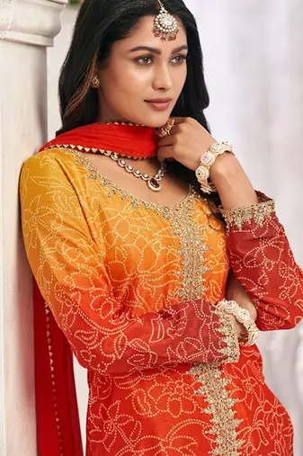 Orange chiffon sequins work semi stitched salwar suits suits size up to 42