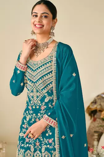Turquoise chiffon sequins work semi stitched salwar suits suits size up to 42