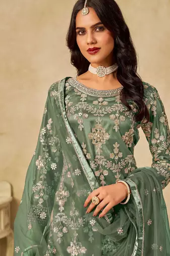 Green net sequins work semi stitched salwar suits suits size up to 42