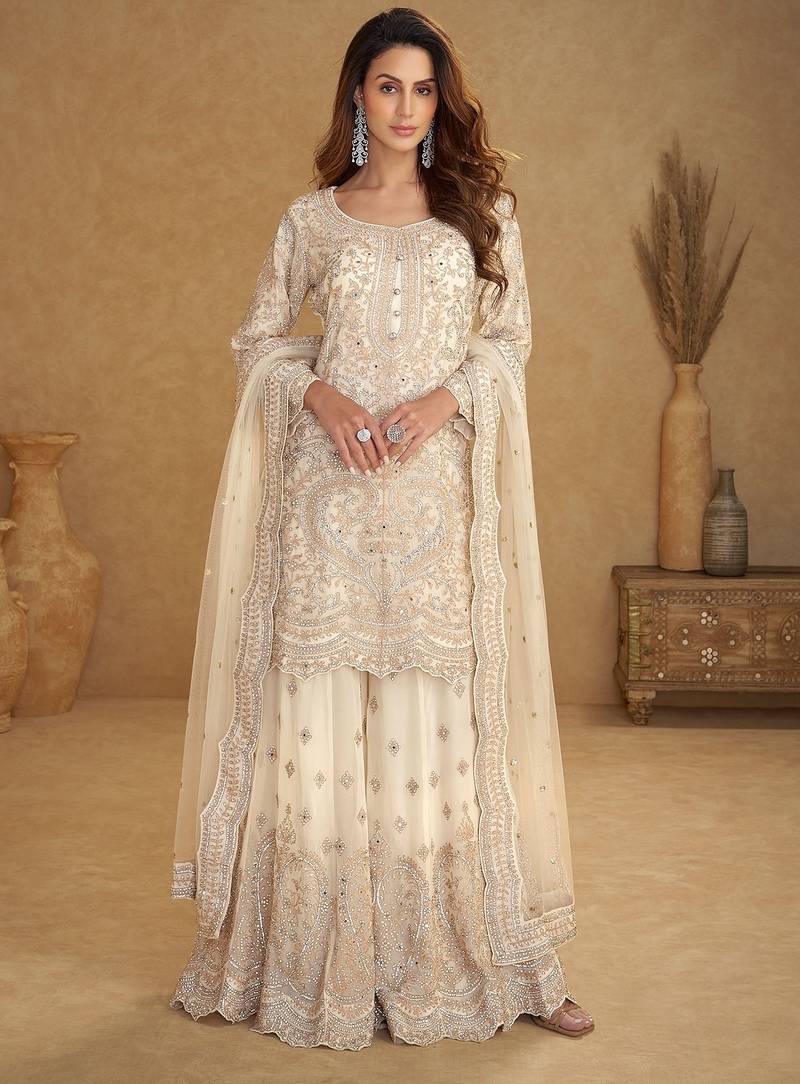 Off white net sequins work semi stitched salwar suits suits size up to 42