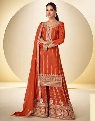 Orange chiffon sequins work semi stitched salwar suits suits size up to 42 1