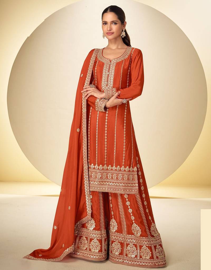 Orange chiffon sequins work semi stitched salwar suits suits size up to 42