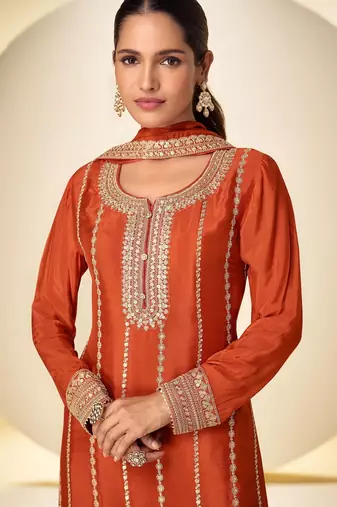 Orange chiffon sequins work semi stitched salwar suits suits size up to 42