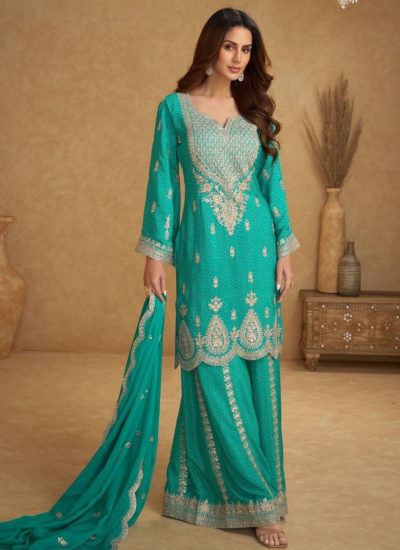 Blue chiffon sequins work semi stitched salwar suits suits size up to 42