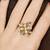 gold kundan pearl floral statement ring