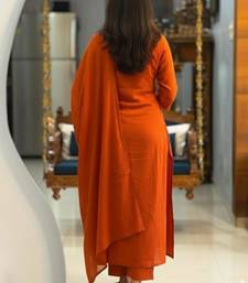 Rust cotton kurta with floral embroidery and dupatta