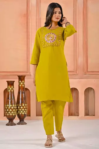 Dark yellow kurta set with printed motifs