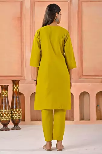 Dark yellow kurta set with printed motifs